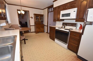 Eat-in area in kitchen has room for your table and