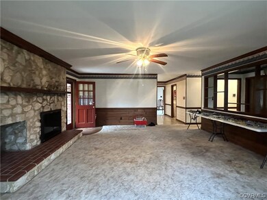 Unfurnished living room with a fireplace, light ca