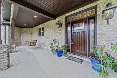 INVITING FRONT PORCH WITH SWING