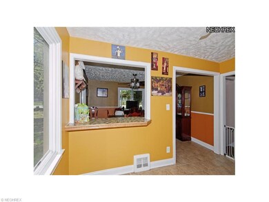 Pass-through between kitchen and dining room.