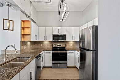 Kitchen featuring light tile patterned flooring, t