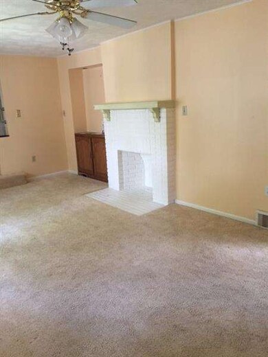 Living room. Decorative fireplace. Hardwoods under