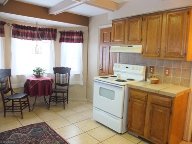 Eat in kitchen with bay window and pantry.