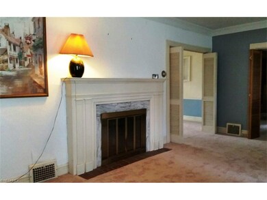 Large LR with newer carpet, opens into Family room and DR