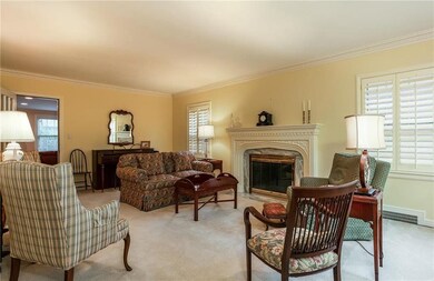 Wide crown moulding, a romantic fireplace with del
