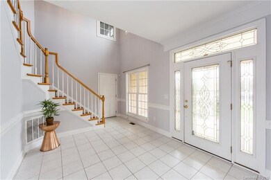 Large 2 story entry foyer, with garage access.