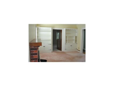 Living Room. Spacious formal living room with buil