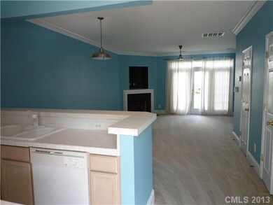 Kitchen - Corner fireplace with TV nook and gas lo