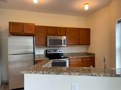 37 Hawthorne Dr unit 415, Bedford, NH 03110 - photo 4