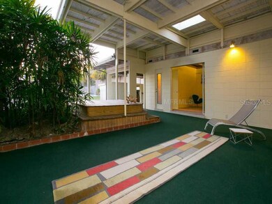 Lanai courtyard area showing sliding glass opening