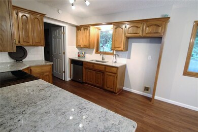 Beautiful granite, farmhouse sink with pot filler style faucet.  What's not to L O V E?