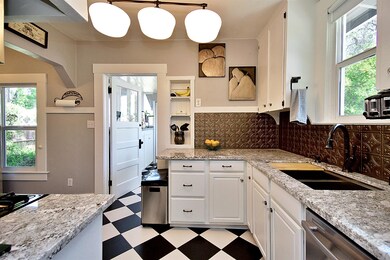 Updated Kitchen with Porcelain tile Floors, Granit