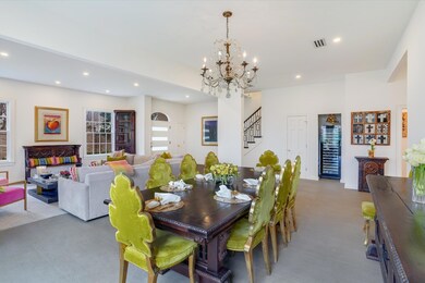 Dining space with stairs, recessed lighting, visi