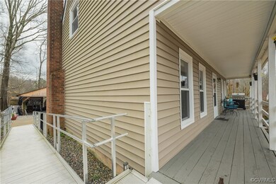 Wooden deck featuring grilling area