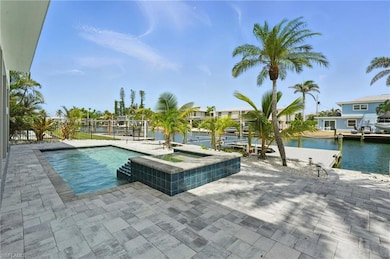 Breathtaking waterfront views from your resort-style pool and private dock! - Virtually Edited Image