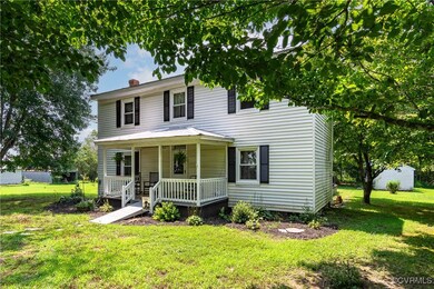 View of front of house featuring a porch and a fro