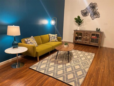Living room featuring baseboards and wood finishe