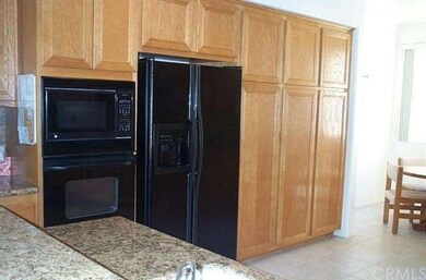 KITCHEN PANTRY, REFRIGERATOR, OVEN AND MICROWAVE