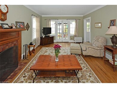 Inviting living room with fireplace, floor to ceil