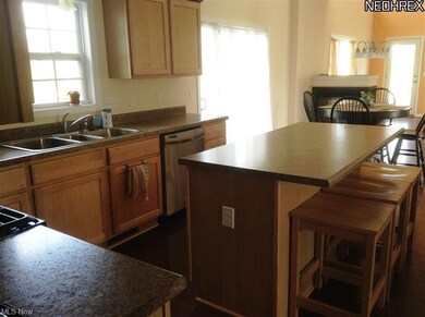 Kitchen Island ads additional seating.