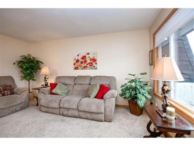 Living Room on upper level- with plenty of natural
