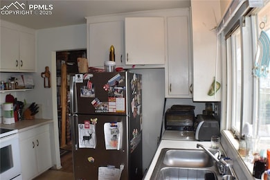 1361 Edith Ln, Colorado Springs, CO 80909 - photo 5