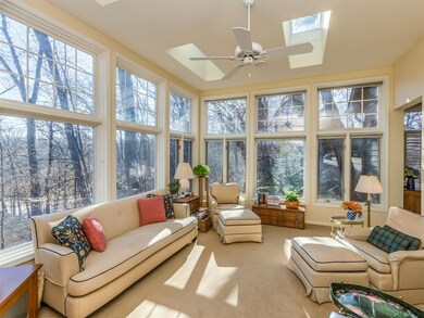 Sunny 4 season sun room overlooking woods and wild