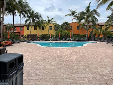 Community pool featuring a patio area