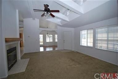 Light and bright floor plan features vaulted ceili