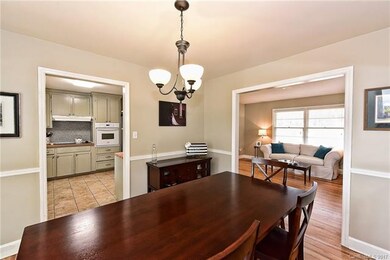View from Dining Room into Kitchen and Family Room