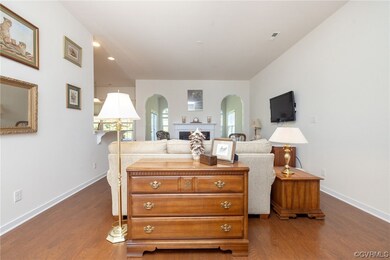 Living room featuring dark hardwood / wood-style f