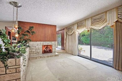 Living room with large sliding glass door leading 