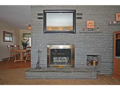 Living Room. Hardwood flooring beneath the carpets