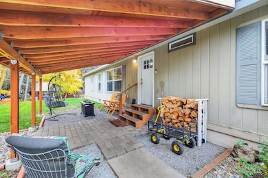 View of patio / terrace featuring entry steps