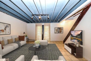 VIRTUAL STAGING - ENTRY FAMILY ROOM