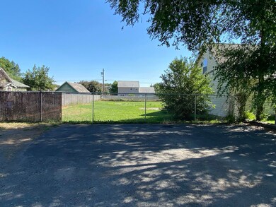 Parking area looking into backyard
