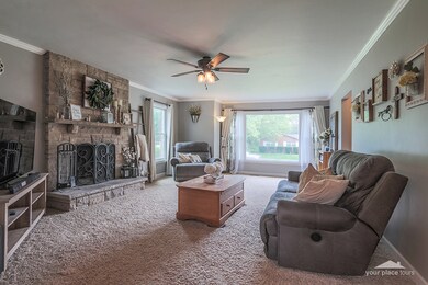 Stylish living room with stone fireplace!