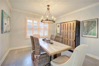 Dining room with plantation shutters. Note the dis