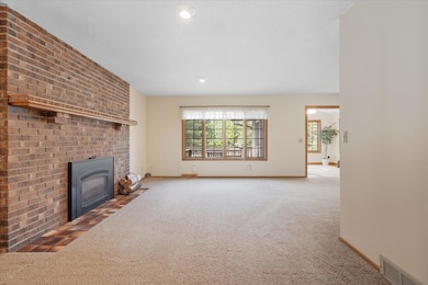 Oversized windows frame beautiful views and fill the room with light.