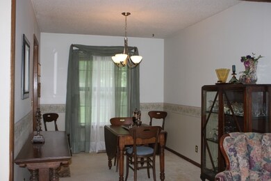 This lovely formal dining is open from Living Room