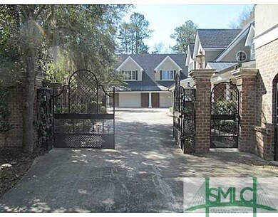 Exterior Front. gated driveway