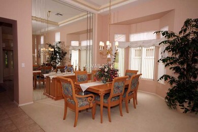 Dining Room. DINING ROOM AREA WITH BEVELED MIRRORE