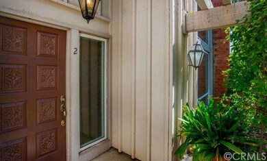 Decorative front door recently painted. Lush lands