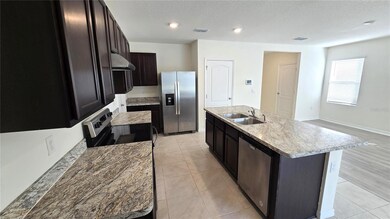 1671 Rosy Dale Cir, Davenport, FL 33837 - photo 7