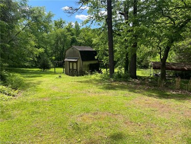 house to the right of photo