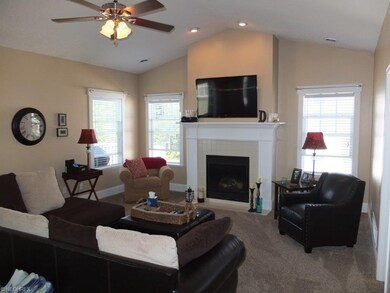 Great room with cathedral ceiling and gas fireplac