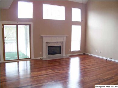 This great room with vaulted ceilings, a lovely fi