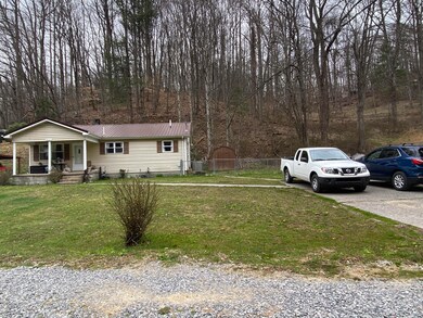 FRONT VIEW WITH DRIVEWAY