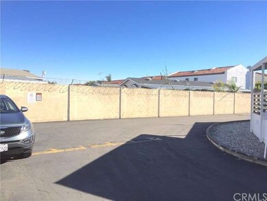 End of the Street along the block wall that leads 
