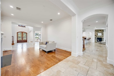 A spacious, open-concept living area with a mix of